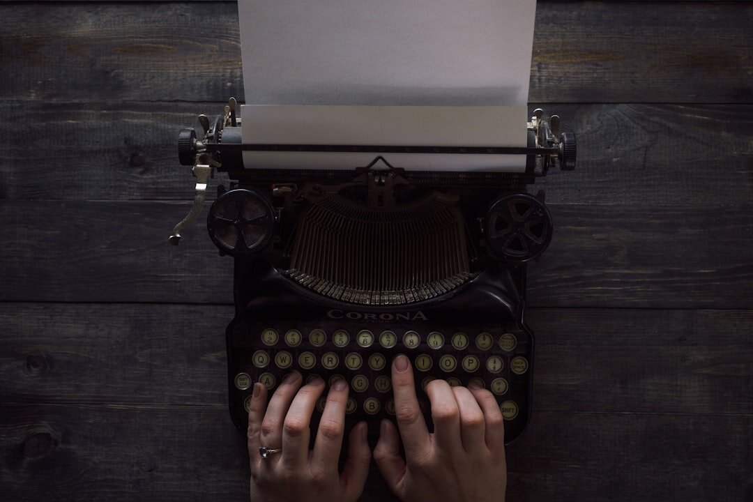 writer typing at night